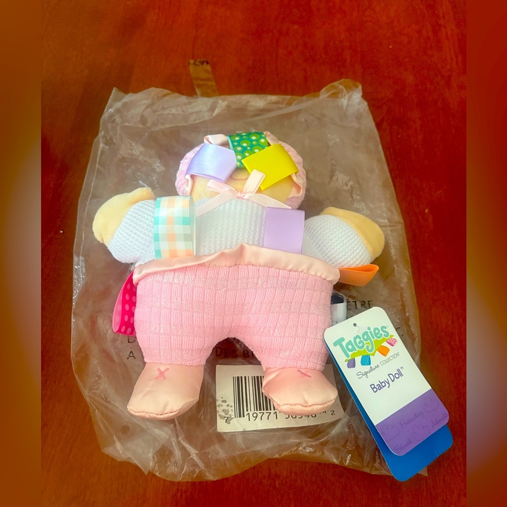 Taggies Baby Doll with Pink and Multicolor Tags